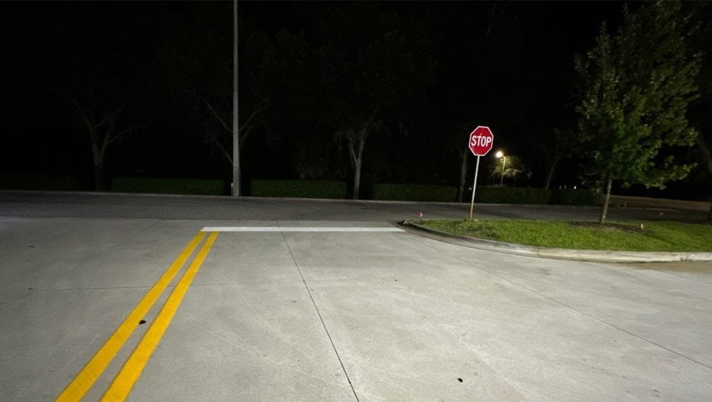 freshly painted arrows on Kangaroo Express parking lot