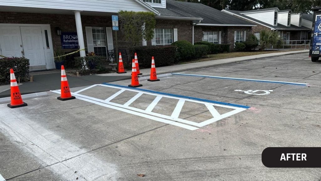 close-up of cross walk freshly painted for Marand Builders and Brooks Rehabilitation parking lot