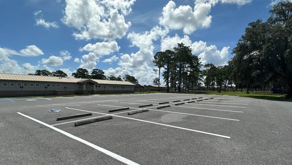 freshly painted line markings for Florida Counterdrug Training Center parking lot