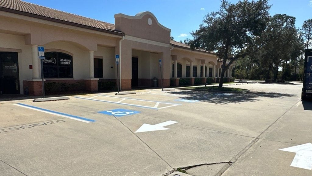 ada compliance parking spots freshly painted for Aza Health Plaz