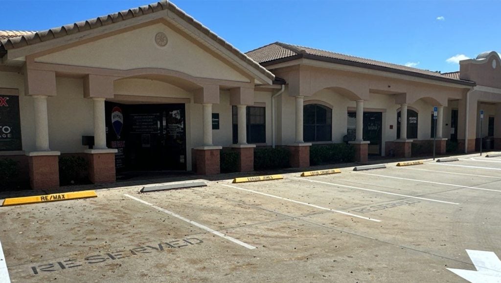 parking spots freshly painted for Aza Health Plaz parking lot