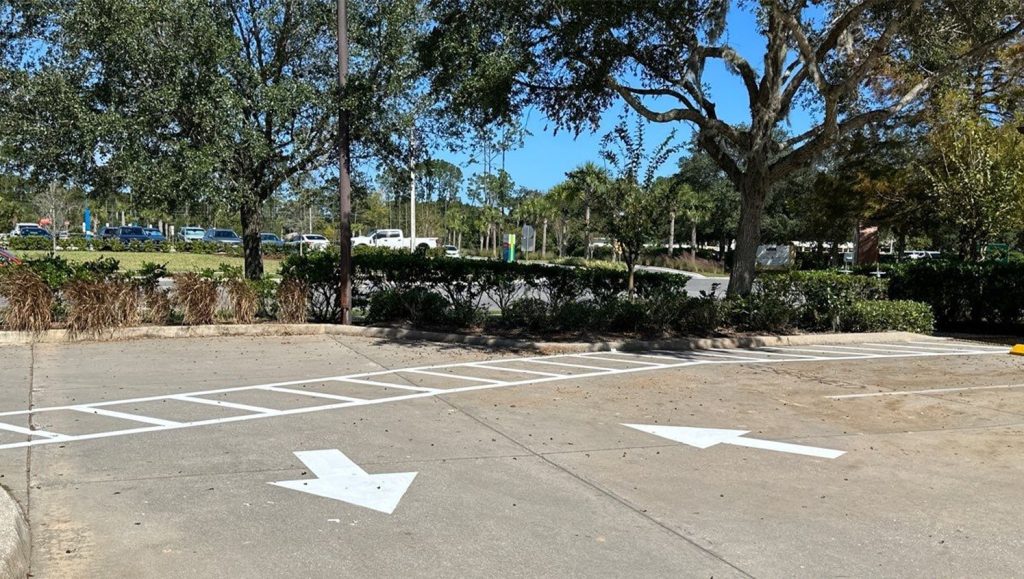 freshly painted white arrows freshly painted for. Aza Health Plaz