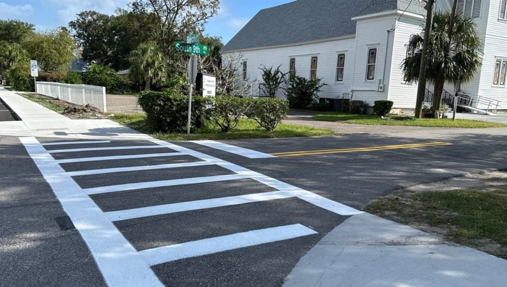 freshly painted crosswalk for City of Fernandina Beach parking lot