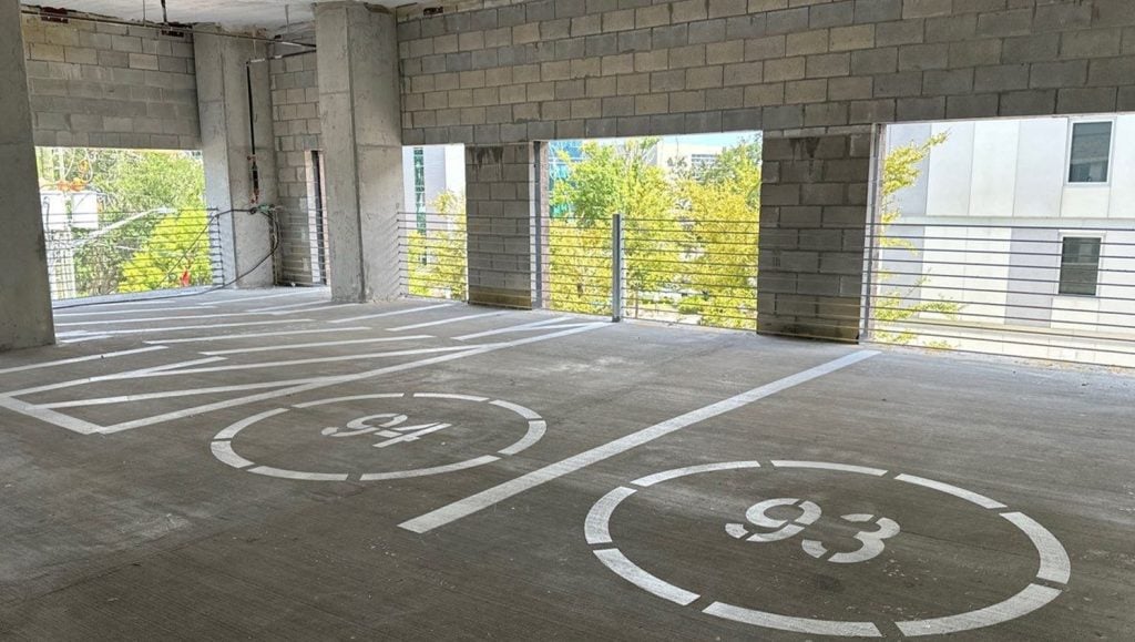 freshly painted line markings for Rabren Construction parking lot