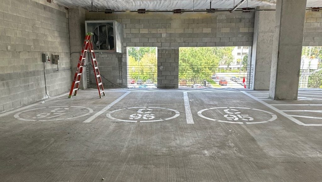 close-up of freshly painted line markings for Rabren Construction parking lot