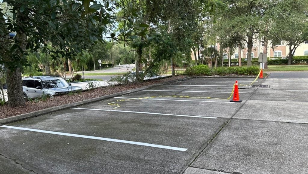 Lakeview Health Center parking lot with cars and freshly painted line markings