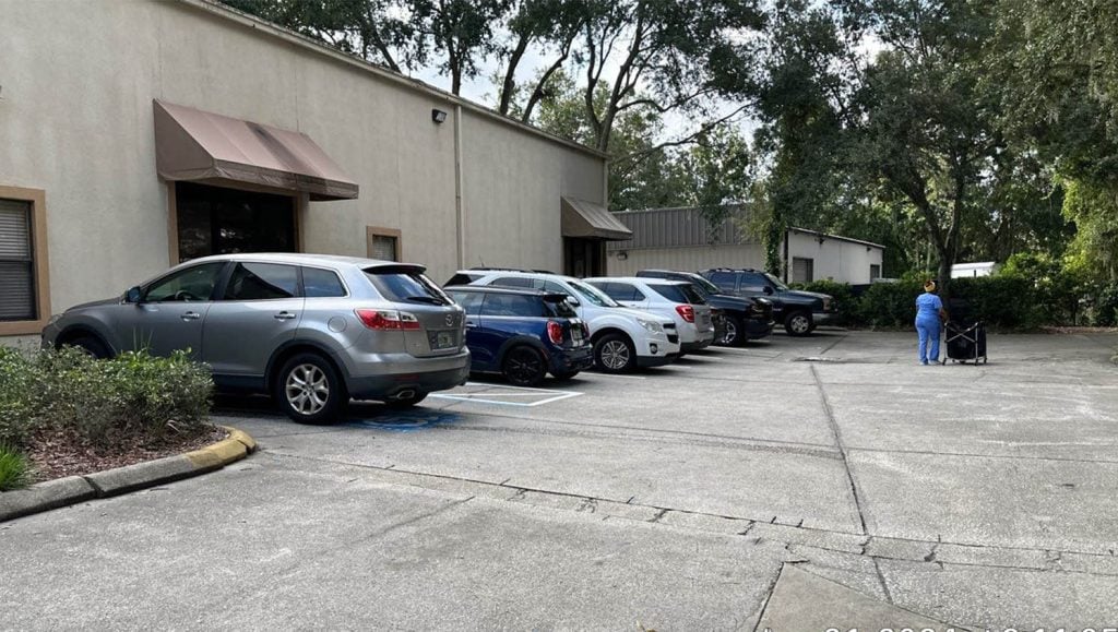 Lakeview Health Center parking lot with cars parked in parking spots