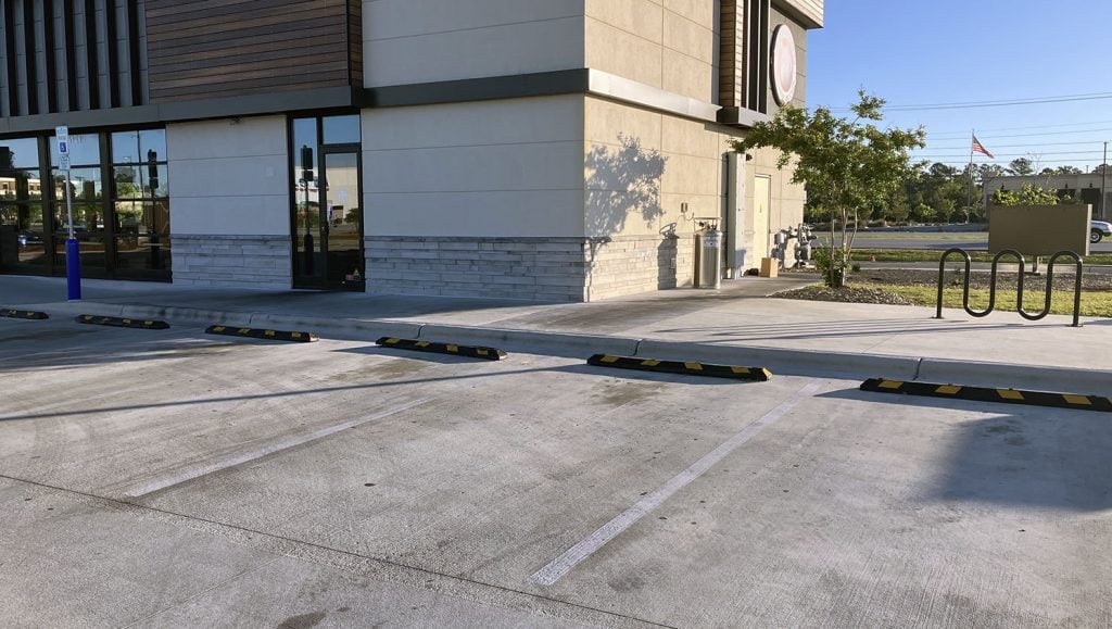 concrete and rubber wheel stop comparison