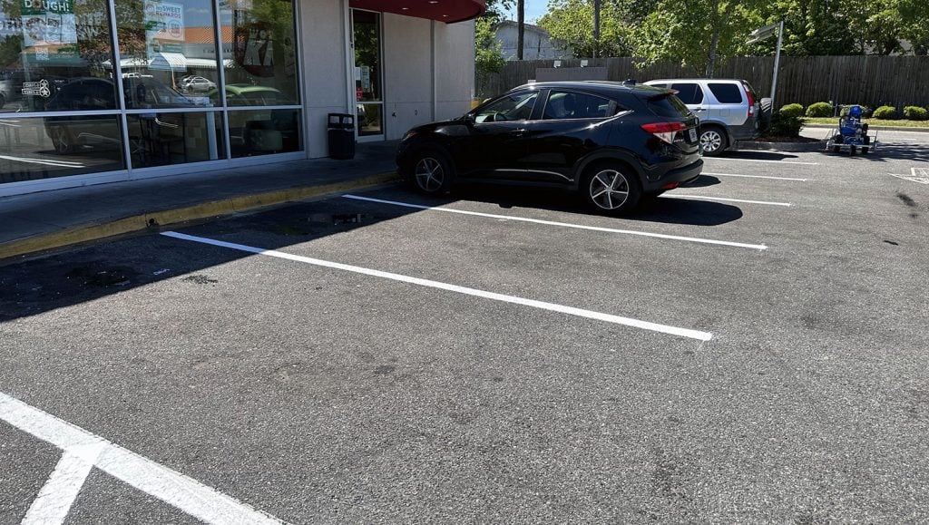 drive-thru arrows striped at krispy kreme