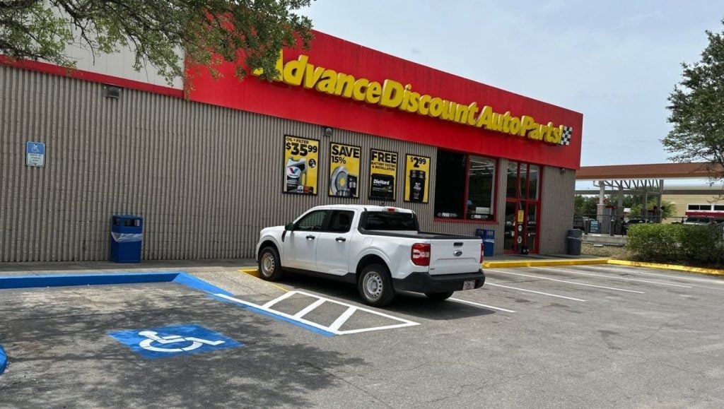 Advanced Auto Parts parking lot with freshly painted parking spots