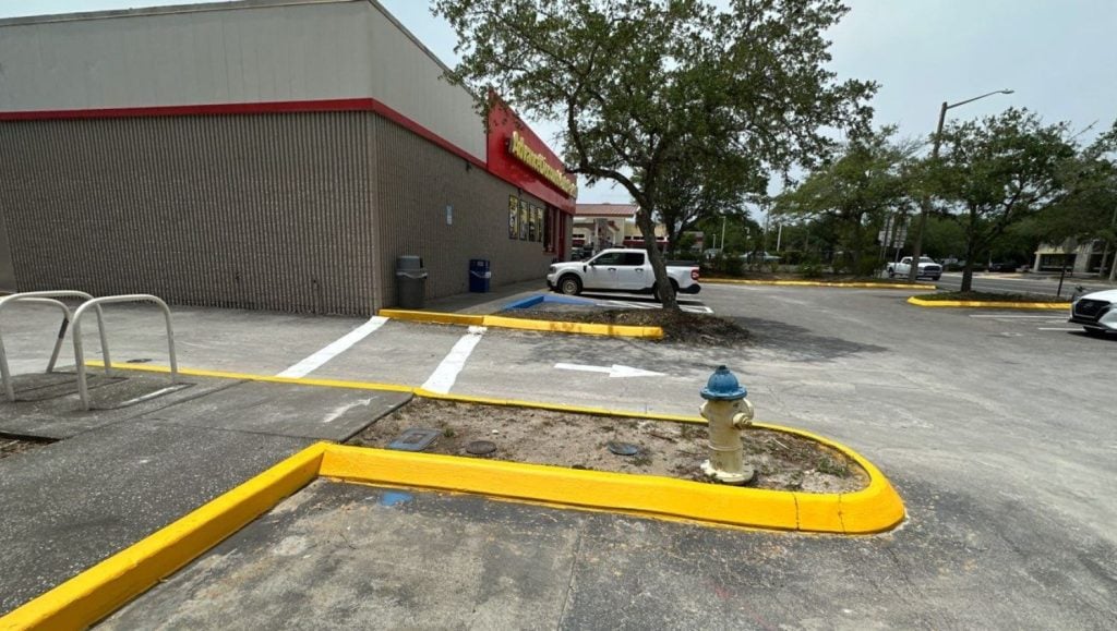 freshly painted line markings for Advanced Auto Parts parking lot