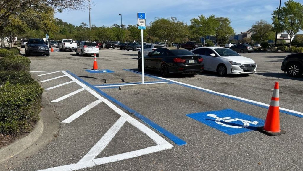 ada compliance parking spots freshly painted for Avenues Walk Shopping Mall
