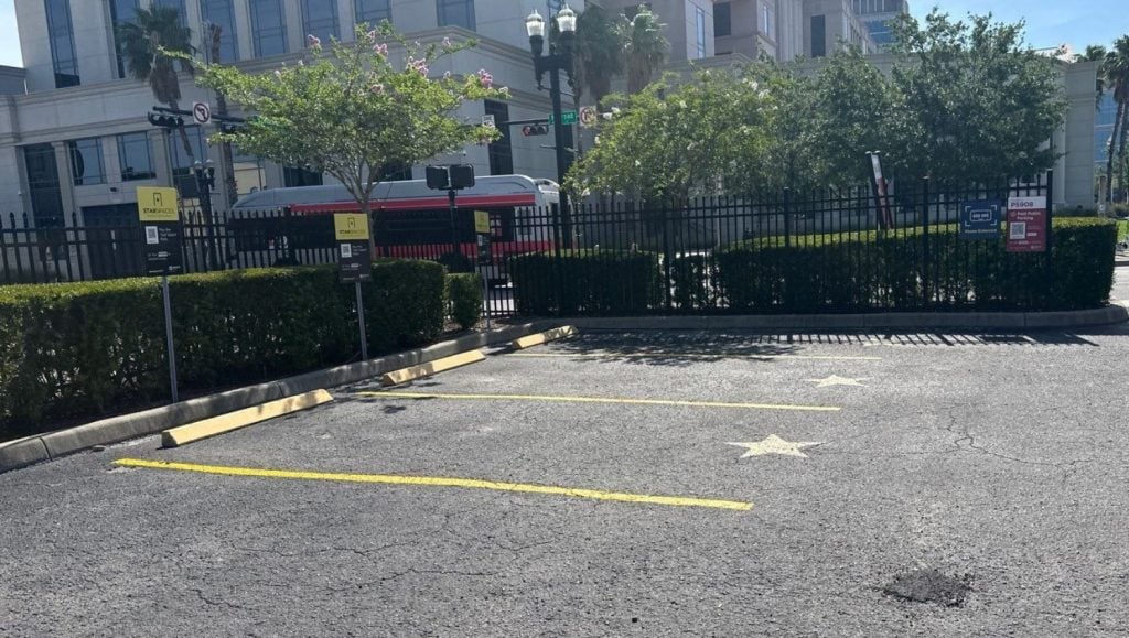 parking spots freshly painted for Premium Parking Services parking lot