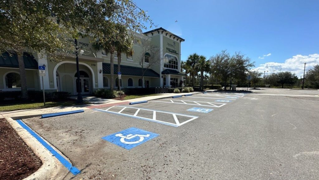 ada compliance parking spots freshly painted for Town Center Medical parking lot