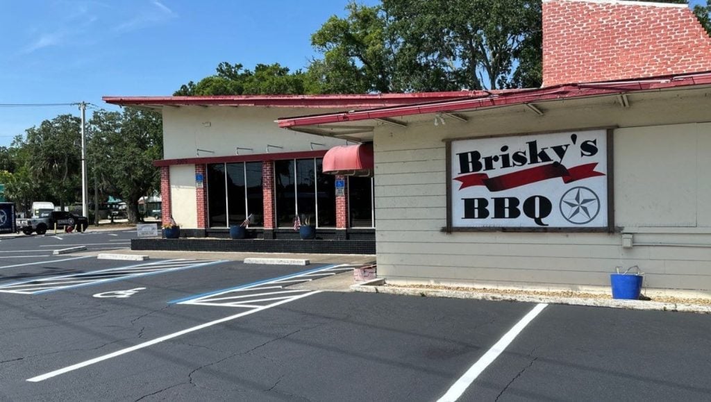 front view of Brisky's BBQ parking lot freshly painted