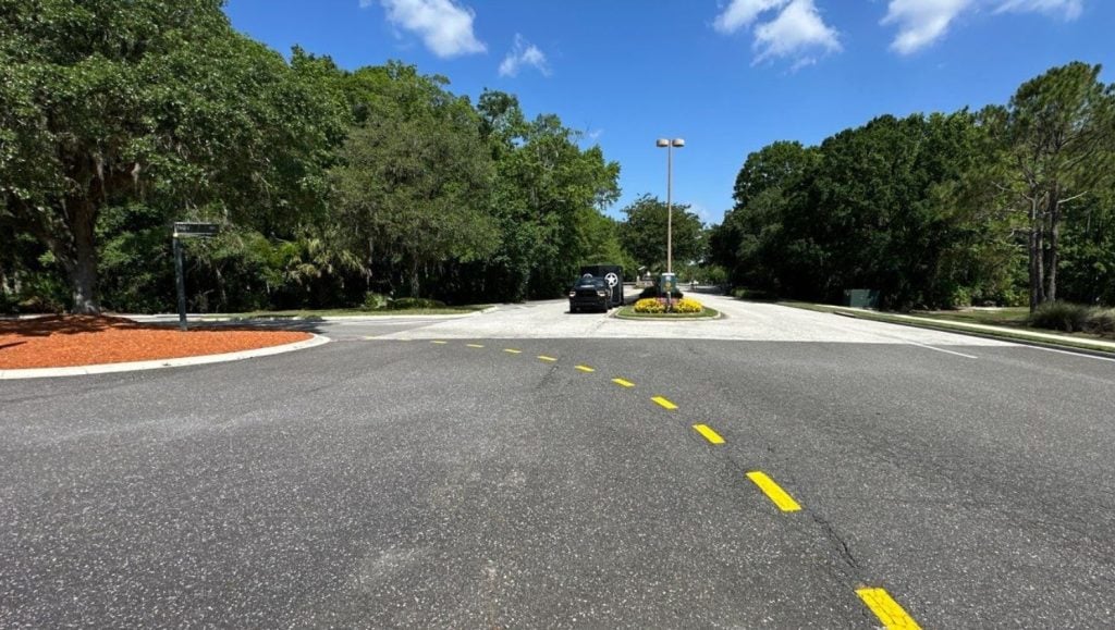 yellow lines freshly painted for May Management parking lot