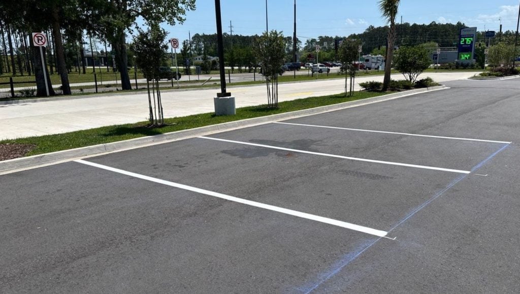 parking spots freshly painted for Parker's Kitchen parking lot