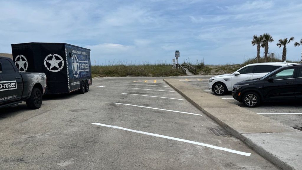 parking spots freshly painted for Azure Oceanfront Residences parking lot