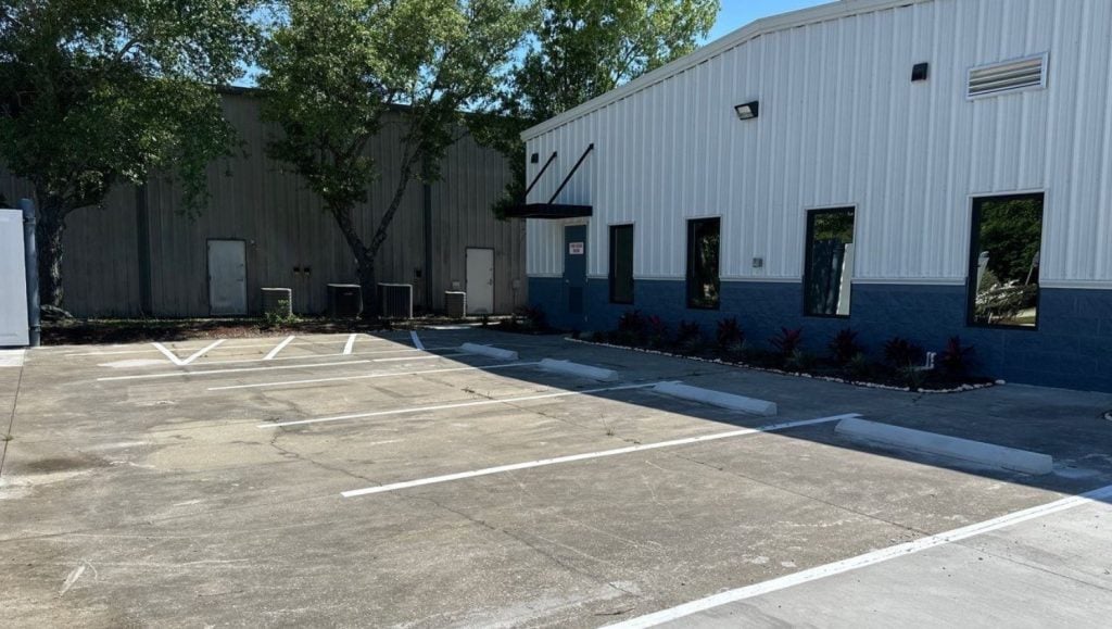 parking stops freshly painted for ECoVets Specialists & Emergency