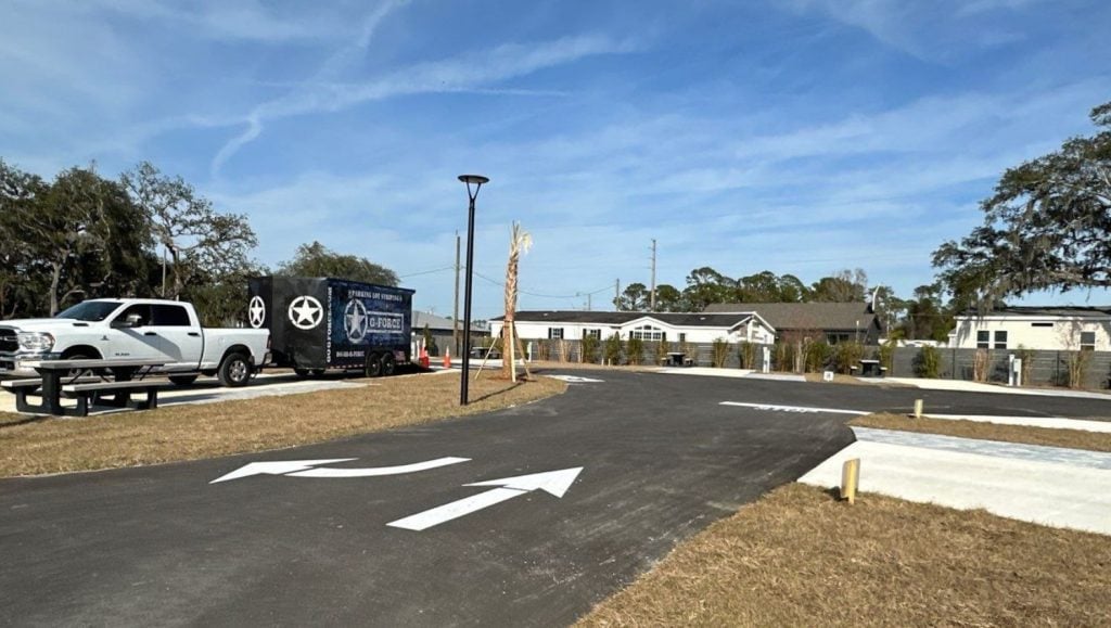 Northflow RV Resort & Marina parking lot with freshly painted line markings