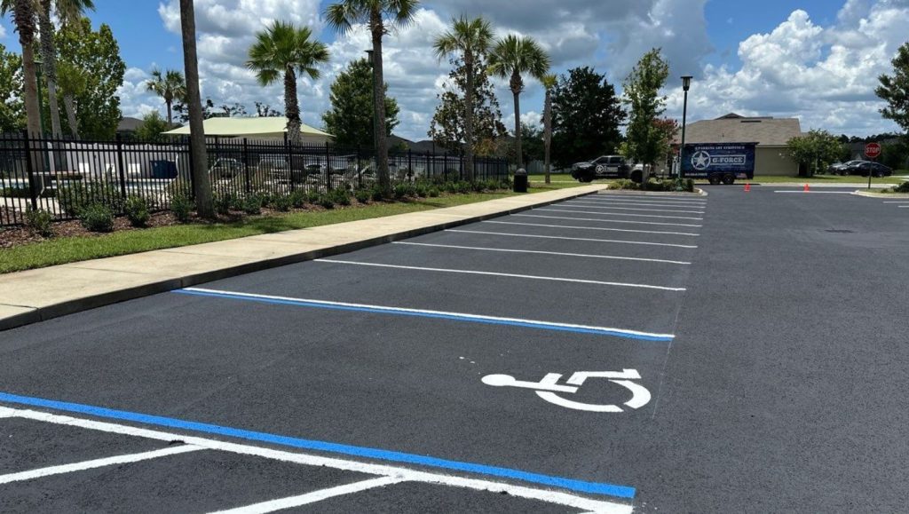 close-up of ada compliance parking spots freshly painted