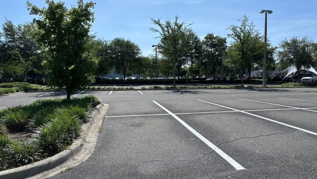 Mercedes-Benz of Gainesville parking lot with freshly painted parking spots