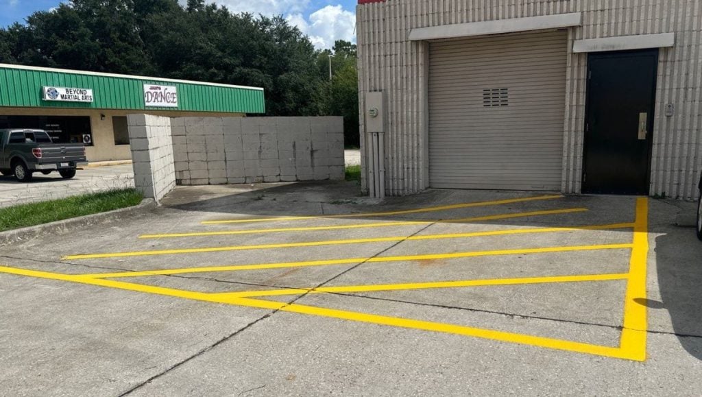 Advanced Auto Parts parking lot with a crosswalk freshly painted