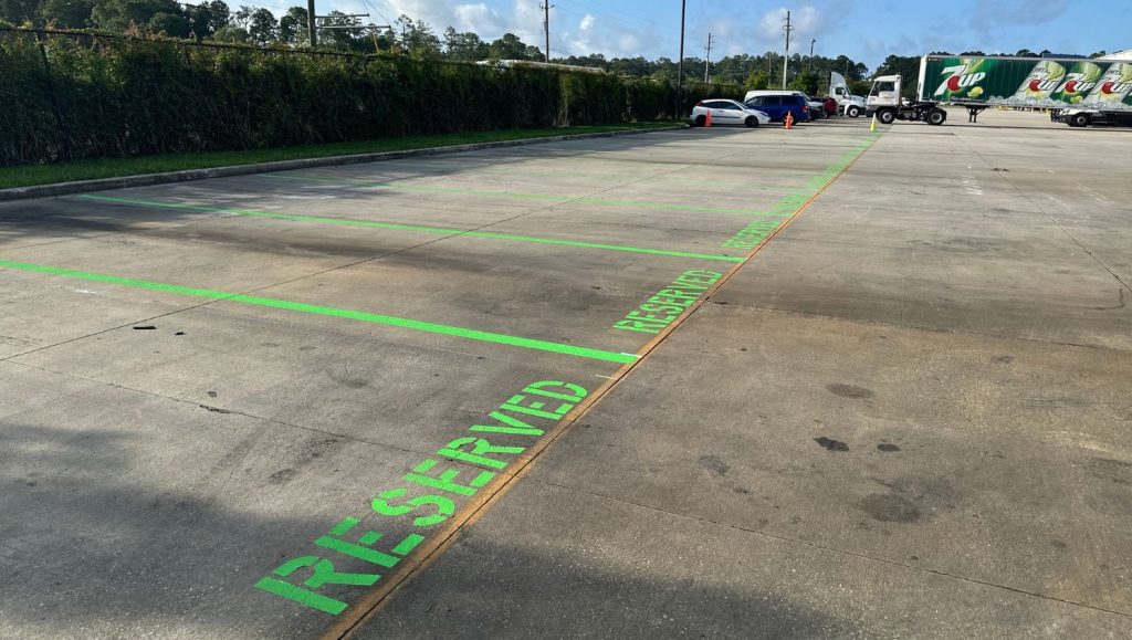 parking spots freshly painted for Keurig Dr. Pepper