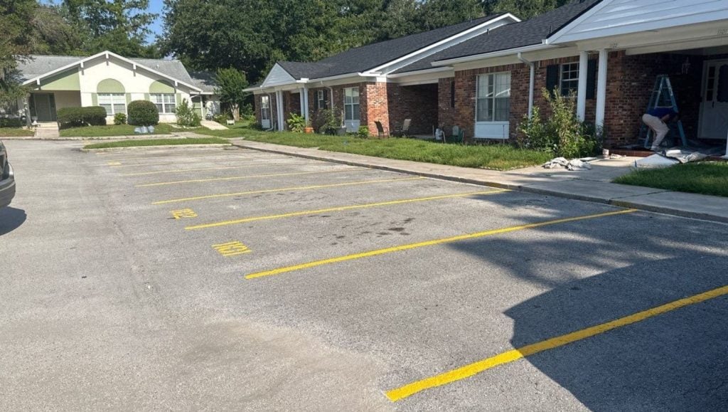 Solano Grove Condominiums parking lot with freshly painted line markings