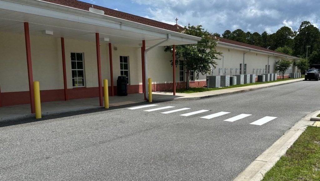 crosswalk freshly painted for St. Patrick Catholic Church parking lot
