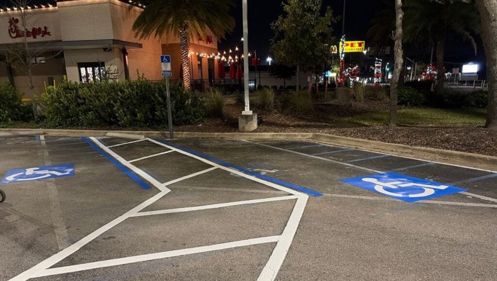 Chipotle parking lot with freshly painted ada compliance parking spots