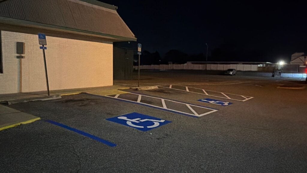 ada compliance parking spots freshly painted for Orange Buffet