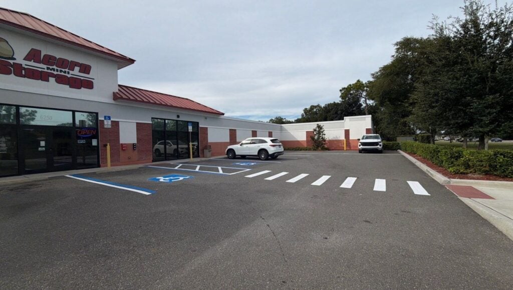 ada compliance parking spots freshly painted for Acorn Mini Storage parking lot