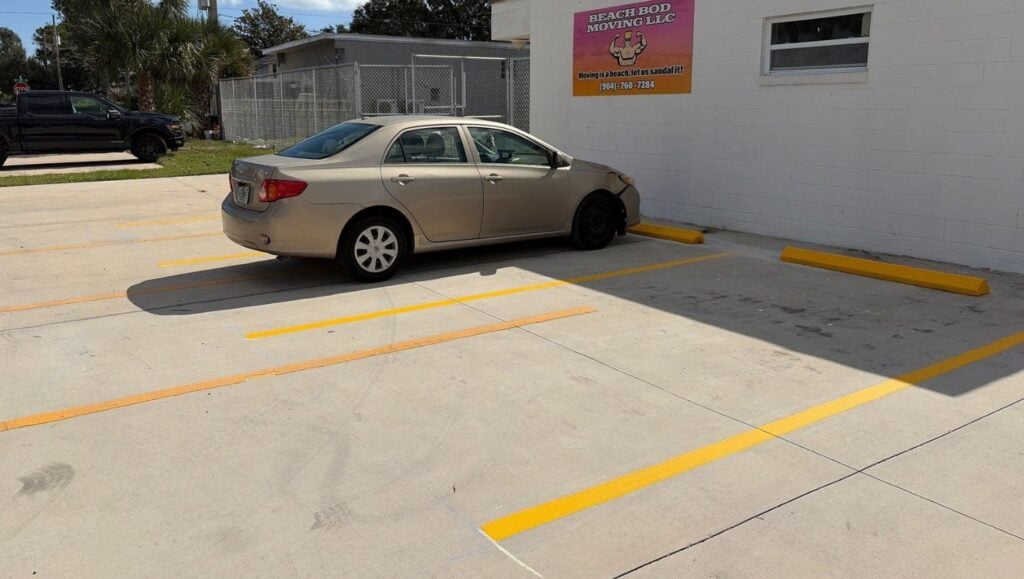 Beach Body Towing parking lot freshly painted