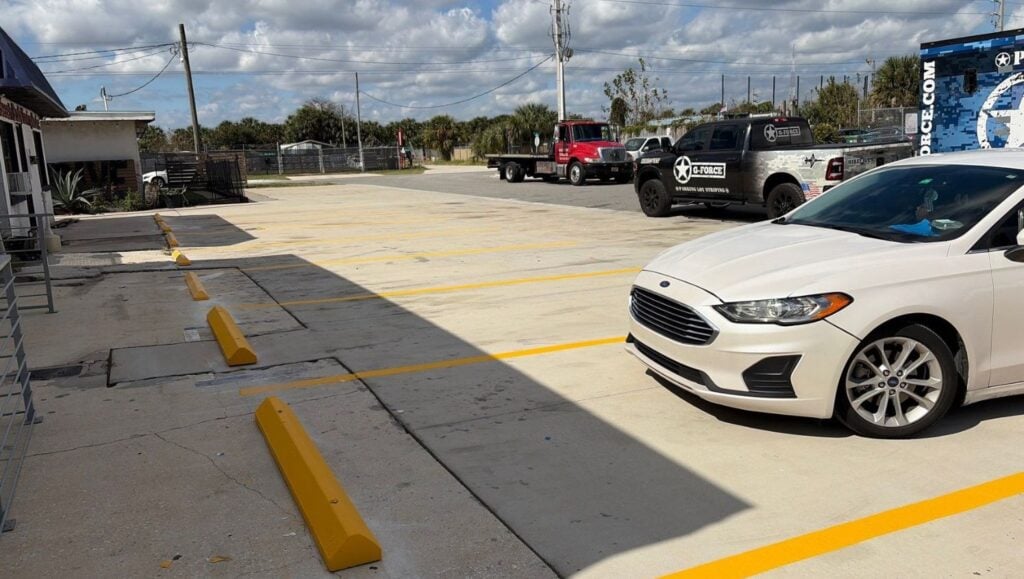 Beach Body Towing parking lot with freshly painted parking spots