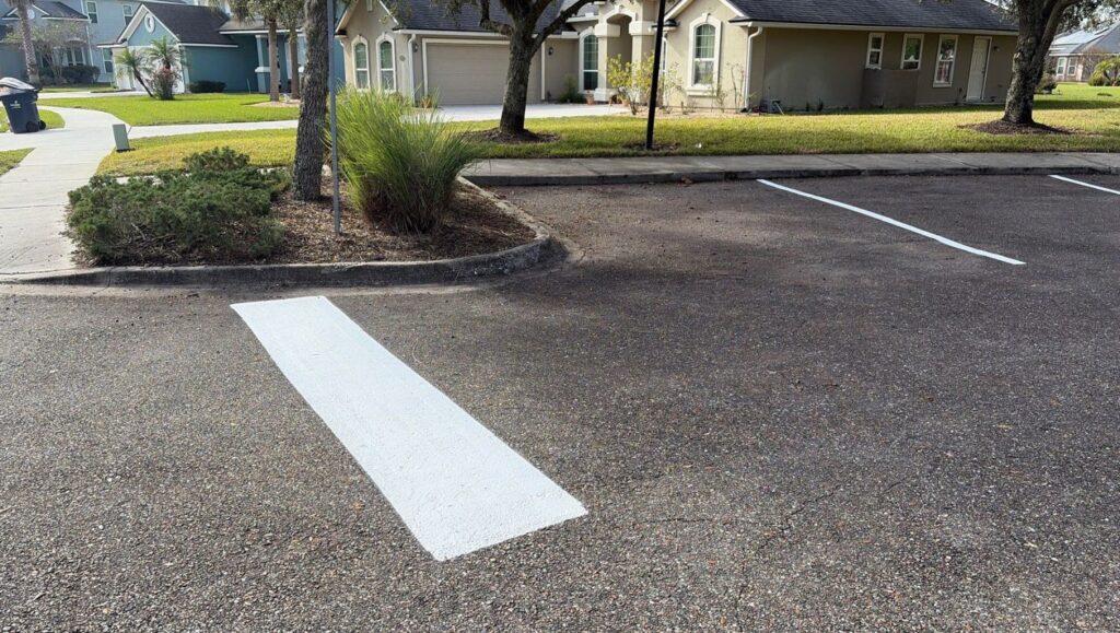 white line markings freshly painted for Governmental Management Services - Amelia Concourse CDD