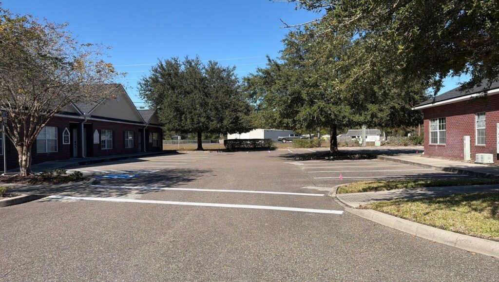 Johnson Property Management parking lot freshly painted