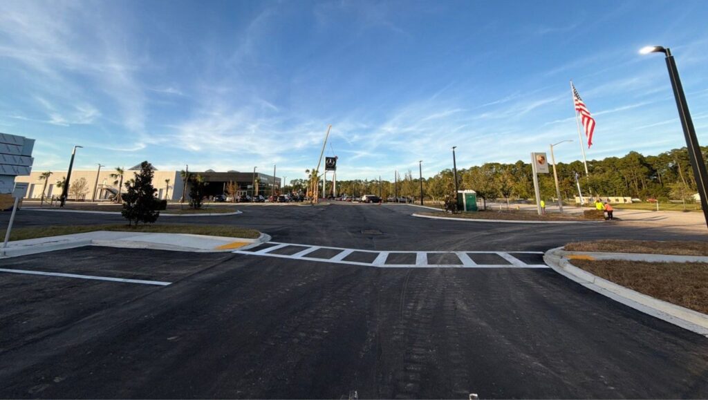 white line markings freshly painted for Fields Porsche parking lot