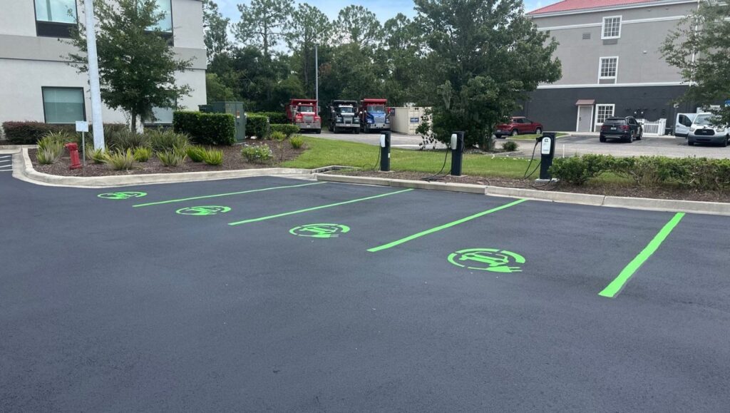 ev charging bay markings freshly painted for home2suites parking lot