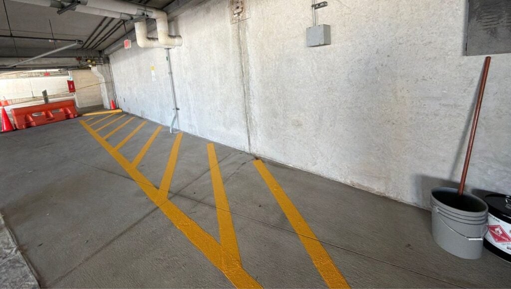 yellow line markings freshly painted for Baptist Medical Center Parking Garage