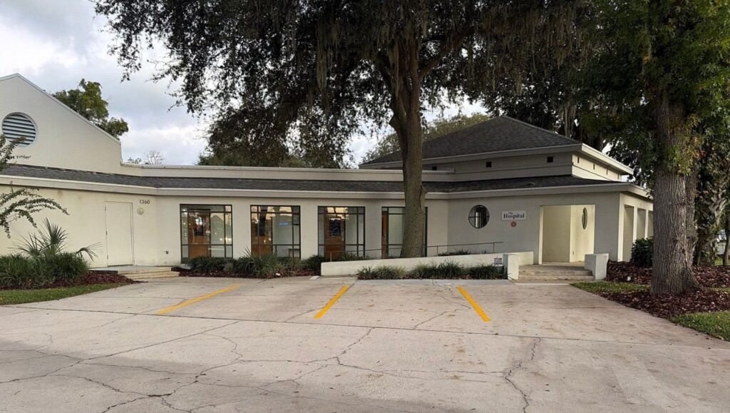front view of St. John's Veterinarian Hospital parking lot freshly painted