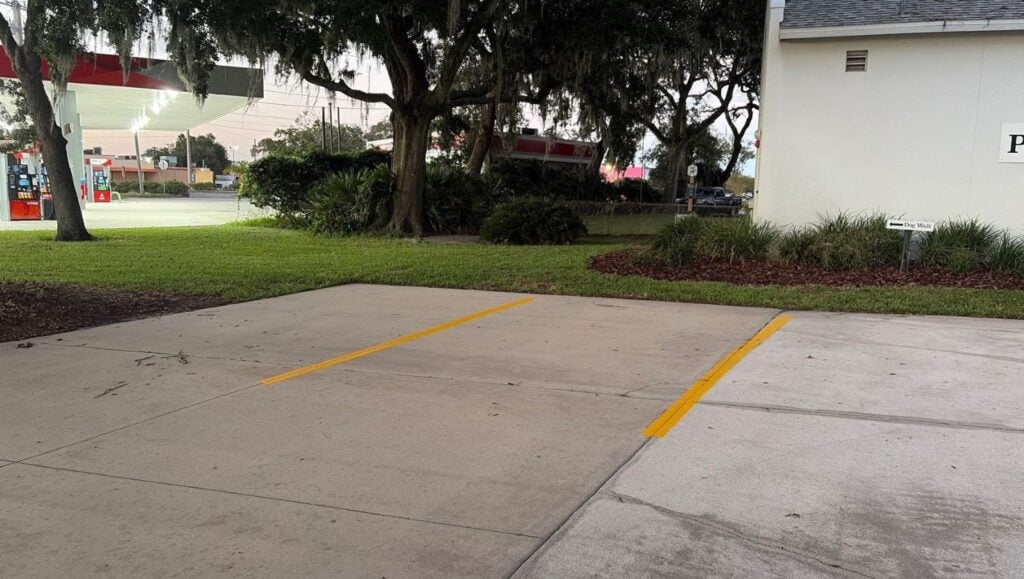 freshly painted line markings for St. John's Veterinarian Hospital parking lot