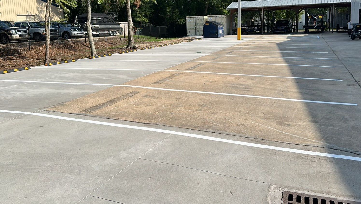 a concrete pad with new parking lines