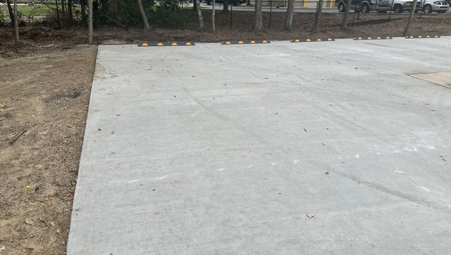 a concrete pad with no parking lines