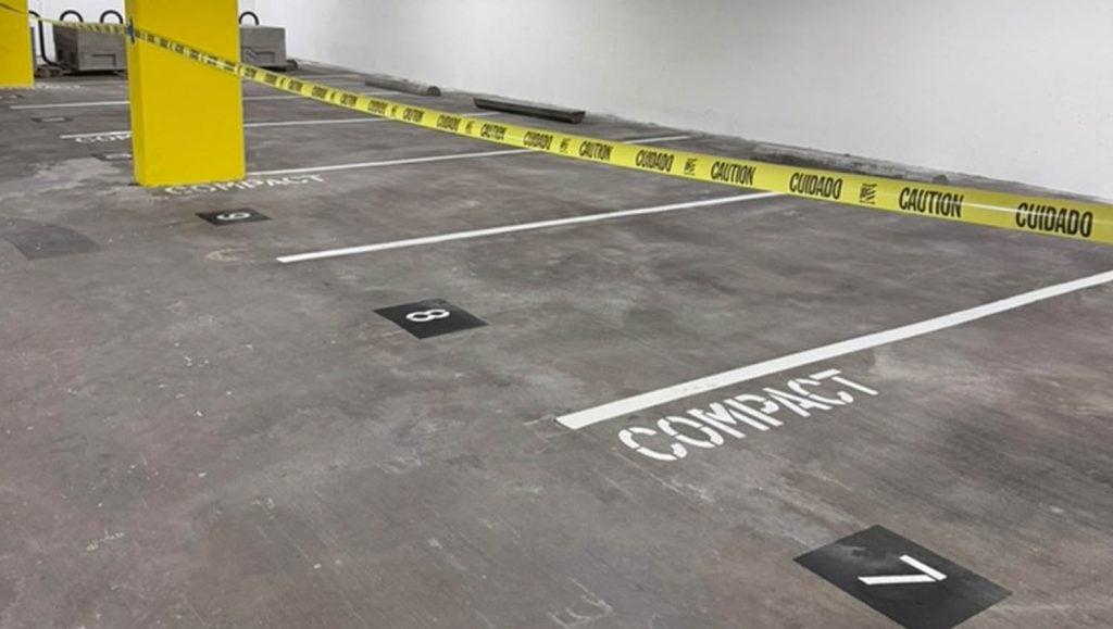freshly painted parking spots for Marriott Vacation Club and Hotel Waikiki parking garage