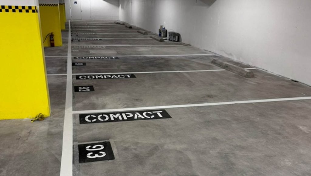 Marriott Vacation Club and Hotel Waikiki parking garage with freshly painted parking spots