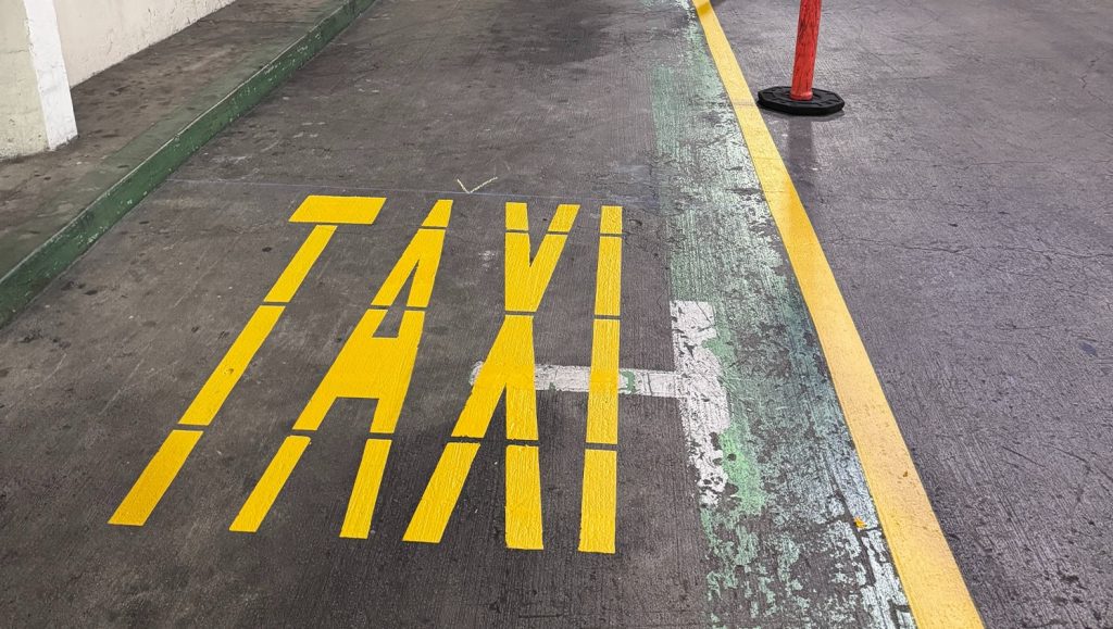 side view of new taxi markings for Ala Moana Shopping Center parking lot