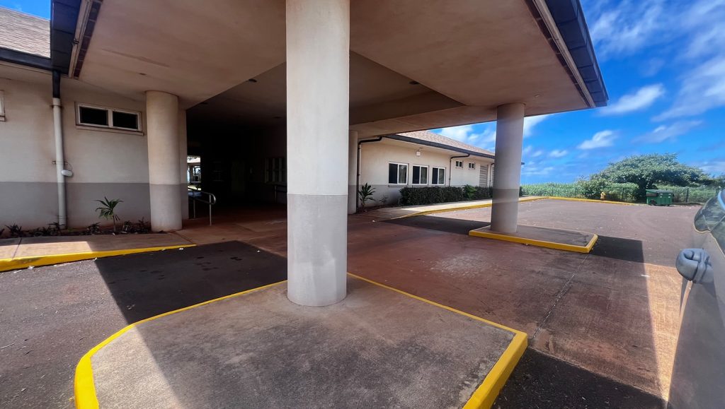 close-up of curb painting for Easterseals Hawaii parking lot