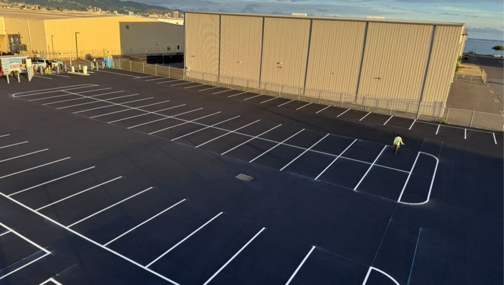 Lānai Air parking lot with freshly painted line markings aerial view