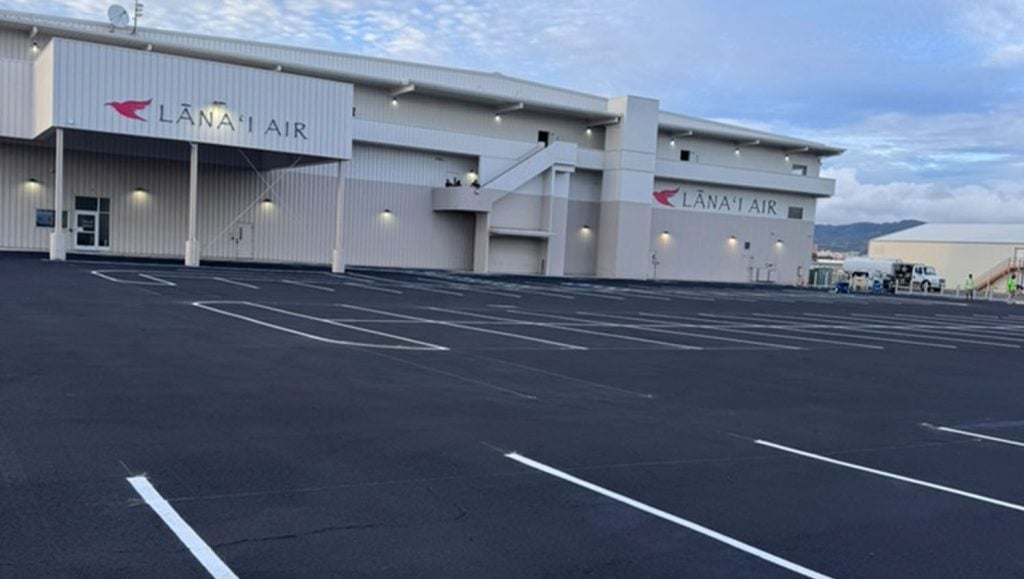 close-up front view of Lānai Air parking lot freshly painted